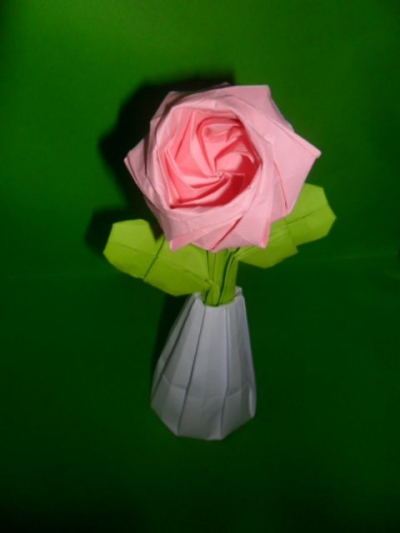 Origami rose in vase